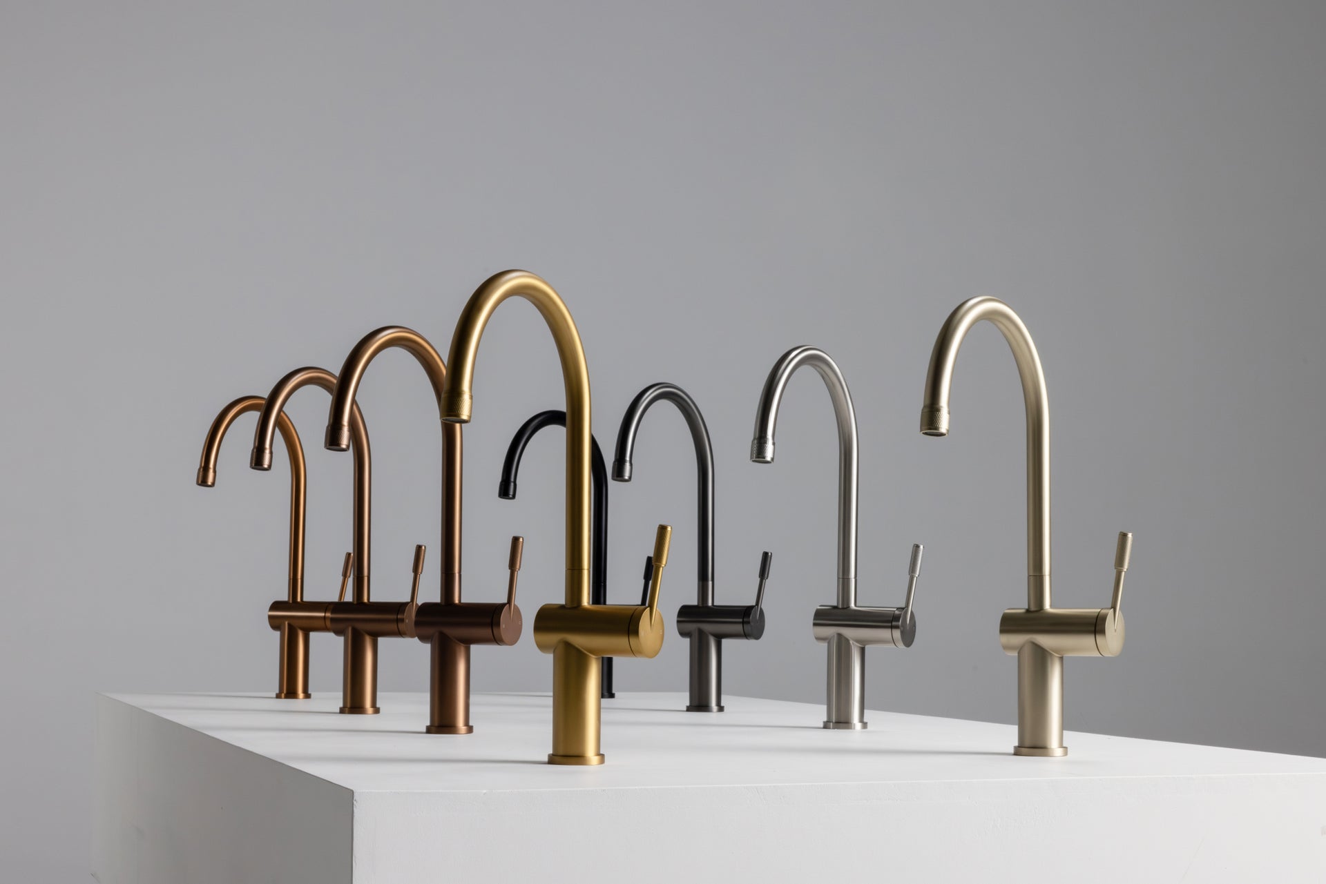 Close up video of Titan gooseneck kitchen mixer tap collection showing all colours including matte black, gunmetal, brass, rose gold, gold, stainless steel. 